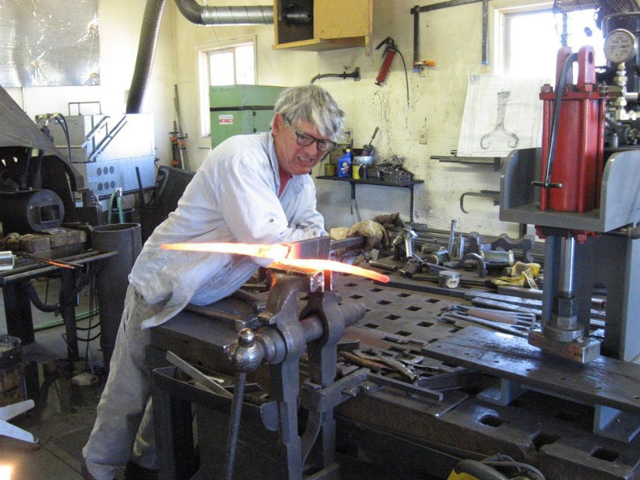 Barr works hot steel in his shop (Photo courtesy of Barr)